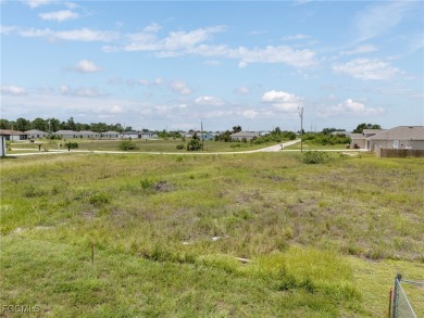 Located in a growing area of Lehigh Acres, this mostly-cleared on Copperhead Golf Club in Florida - for sale on GolfHomes.com, golf home, golf lot
