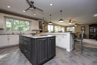 A Stunning Lakefront Retreat on the  Shores of Table Rock on Kimberling City Golf Club in Missouri - for sale on GolfHomes.com, golf home, golf lot