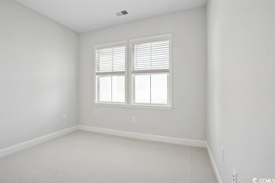 Fall in love with this move-in ready 4-bedroom, 2.5-bath home in on Tidewater Golf Club and Plantation in South Carolina - for sale on GolfHomes.com, golf home, golf lot