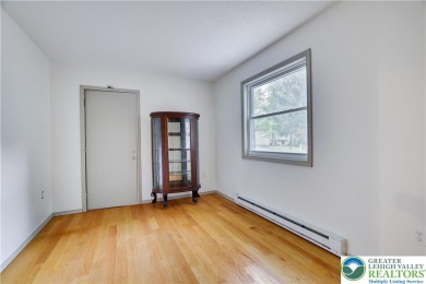 Step into this 3 bed 2 bath home and imagine placing your on Pocono Farms Country Club in Pennsylvania - for sale on GolfHomes.com, golf home, golf lot