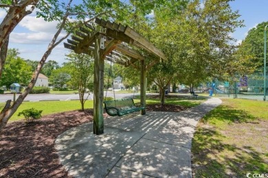 Fall in love with this move-in ready 4-bedroom, 2.5-bath home in on Tidewater Golf Club and Plantation in South Carolina - for sale on GolfHomes.com, golf home, golf lot