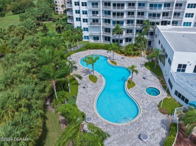 Experience luxury living in this beautiful two-bedroom on Oceans Golf Club in Florida - for sale on GolfHomes.com, golf home, golf lot