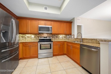 Experience luxury living in this beautiful two-bedroom on Oceans Golf Club in Florida - for sale on GolfHomes.com, golf home, golf lot