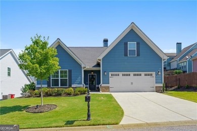 Welcome to this charming home in the highly sought-after on Traditions of Braselton Golf Club in Georgia - for sale on GolfHomes.com, golf home, golf lot