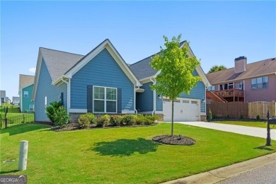 Welcome to this charming home in the highly sought-after on Traditions of Braselton Golf Club in Georgia - for sale on GolfHomes.com, golf home, golf lot