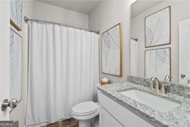 Welcome to this charming home in the highly sought-after on Traditions of Braselton Golf Club in Georgia - for sale on GolfHomes.com, golf home, golf lot