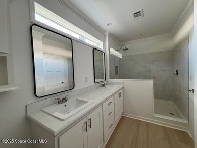 Brand-New 2026 Model Home in Barefoot Bay! Step into modern on Barefoot Bay Golf Course in Florida - for sale on GolfHomes.com, golf home, golf lot