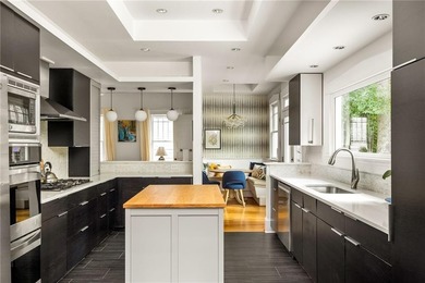 Perched proudly atop a hill in the heart of Candler Park, this on Candler Park Golf Course in Georgia - for sale on GolfHomes.com, golf home, golf lot