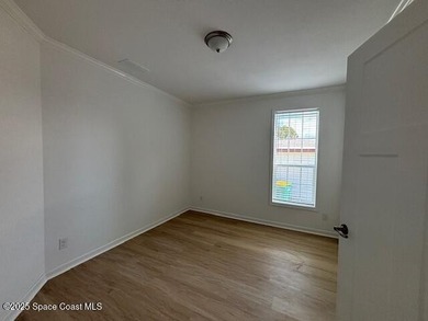 Brand-New 2026 Model Home in Barefoot Bay! Step into modern on Barefoot Bay Golf Course in Florida - for sale on GolfHomes.com, golf home, golf lot