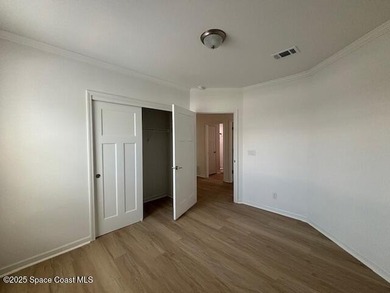 Brand-New 2026 Model Home in Barefoot Bay! Step into modern on Barefoot Bay Golf Course in Florida - for sale on GolfHomes.com, golf home, golf lot