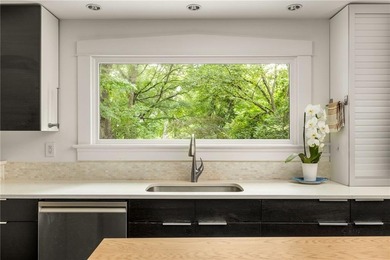 Perched proudly atop a hill in the heart of Candler Park, this on Candler Park Golf Course in Georgia - for sale on GolfHomes.com, golf home, golf lot