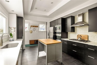 Perched proudly atop a hill in the heart of Candler Park, this on Candler Park Golf Course in Georgia - for sale on GolfHomes.com, golf home, golf lot