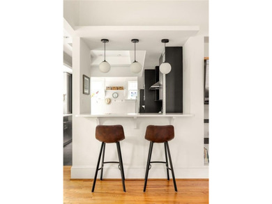 Perched proudly atop a hill in the heart of Candler Park, this on Candler Park Golf Course in Georgia - for sale on GolfHomes.com, golf home, golf lot