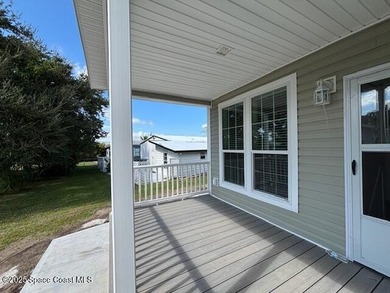 Brand-New 2026 Model Home in Barefoot Bay! Step into modern on Barefoot Bay Golf Course in Florida - for sale on GolfHomes.com, golf home, golf lot