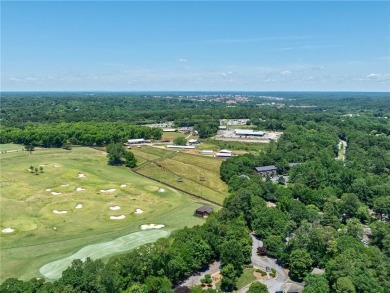 Looking for the convenience of condo living with the square on University of Georgia Golf Course in Georgia - for sale on GolfHomes.com, golf home, golf lot