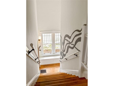 Perched proudly atop a hill in the heart of Candler Park, this on Candler Park Golf Course in Georgia - for sale on GolfHomes.com, golf home, golf lot