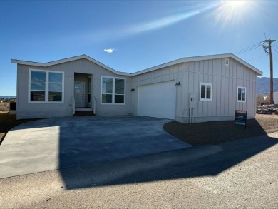 This brand new home is a split floor plan offering 3 large on Pine Shadows Golf Course in Arizona - for sale on GolfHomes.com, golf home, golf lot