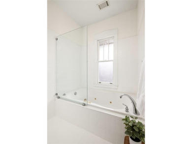 Perched proudly atop a hill in the heart of Candler Park, this on Candler Park Golf Course in Georgia - for sale on GolfHomes.com, golf home, golf lot