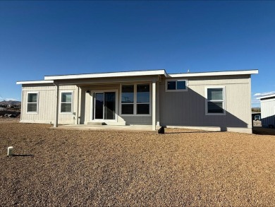 This brand new home is a split floor plan offering 3 large on Pine Shadows Golf Course in Arizona - for sale on GolfHomes.com, golf home, golf lot