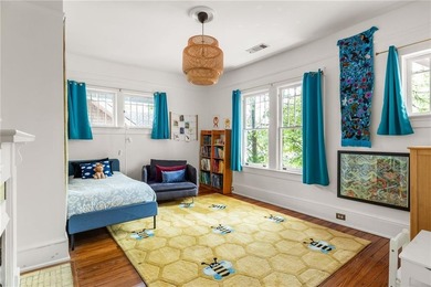 Perched proudly atop a hill in the heart of Candler Park, this on Candler Park Golf Course in Georgia - for sale on GolfHomes.com, golf home, golf lot