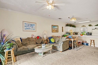 Welcome to this charming two-bedroom, two-bathroom first-floor on Myrtlewood Golf Course and Club  in South Carolina - for sale on GolfHomes.com, golf home, golf lot