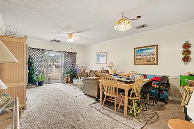 Welcome to this charming two-bedroom, two-bathroom first-floor on Myrtlewood Golf Course and Club  in South Carolina - for sale on GolfHomes.com, golf home, golf lot