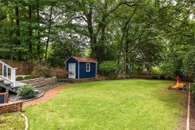 Perched proudly atop a hill in the heart of Candler Park, this on Candler Park Golf Course in Georgia - for sale on GolfHomes.com, golf home, golf lot