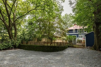 Perched proudly atop a hill in the heart of Candler Park, this on Candler Park Golf Course in Georgia - for sale on GolfHomes.com, golf home, golf lot