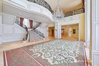 Introducing a palatial waterfront estate on a double lot in the on Jonathans Landing Golf Club in Florida - for sale on GolfHomes.com, golf home, golf lot