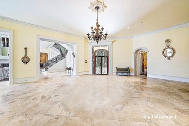 Introducing a palatial waterfront estate on a double lot in the on Jonathans Landing Golf Club in Florida - for sale on GolfHomes.com, golf home, golf lot