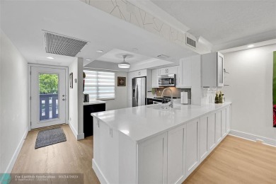 Luxury Floor Plan Remodeled: A Property of Distinction. This on Wynmoor Golf Course in Florida - for sale on GolfHomes.com, golf home, golf lot