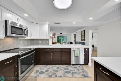 Luxury Floor Plan Remodeled: A Property of Distinction. This on Wynmoor Golf Course in Florida - for sale on GolfHomes.com, golf home, golf lot