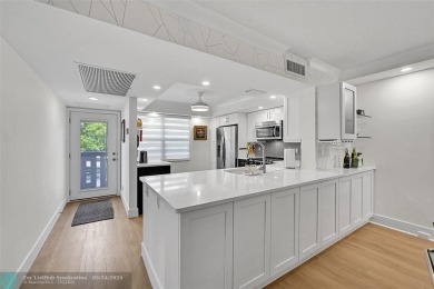 Luxury Floor Plan Remodeled: A Property of Distinction. This on Wynmoor Golf Course in Florida - for sale on GolfHomes.com, golf home, golf lot