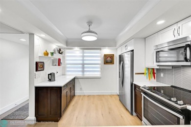 Luxury Floor Plan Remodeled: A Property of Distinction. This on Wynmoor Golf Course in Florida - for sale on GolfHomes.com, golf home, golf lot