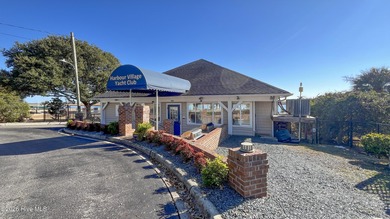 Beautifully situated in the desirable Olde Point community, this on Olde Point Golf and Country Club in North Carolina - for sale on GolfHomes.com, golf home, golf lot