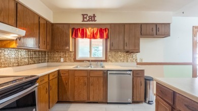 Welcome to this beautifully maintained 5-bed, 2.5-bath home on West Plains Country Club in Missouri - for sale on GolfHomes.com, golf home, golf lot