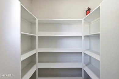 If you've been waiting for a home where you don't have to on The Golf Club At Johnson Ranch in Arizona - for sale on GolfHomes.com, golf home, golf lot