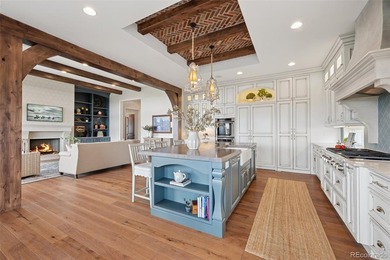 Please watch the video tour! This award-winning French Chateau on The Club At Flying Horse in Colorado - for sale on GolfHomes.com, golf home, golf lot