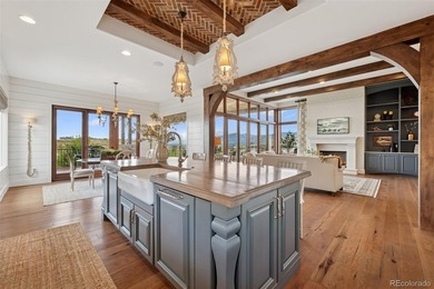 Please watch the video tour! This award-winning French Chateau on The Club At Flying Horse in Colorado - for sale on GolfHomes.com, golf home, golf lot