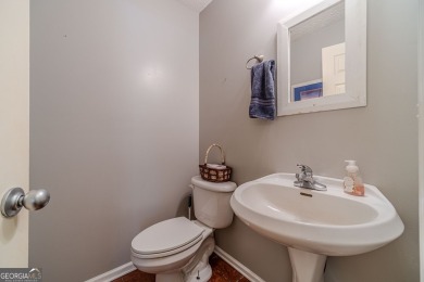 Welcome to 711 Wellington Drive, a charming home nestled in the on Monroe Golf and Country Club in Georgia - for sale on GolfHomes.com, golf home, golf lot