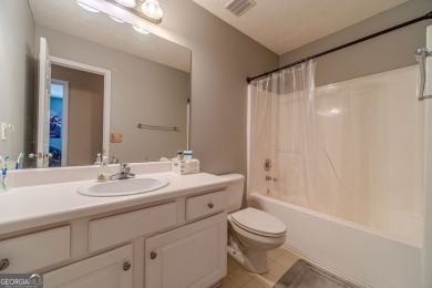 Welcome to 711 Wellington Drive, a charming home nestled in the on Monroe Golf and Country Club in Georgia - for sale on GolfHomes.com, golf home, golf lot