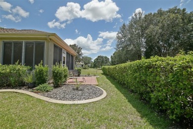 Lovely Kingston Patio home on corner lot with views to the Golf on Eagle Ridge At Spruce Creek Country Club in Florida - for sale on GolfHomes.com, golf home, golf lot