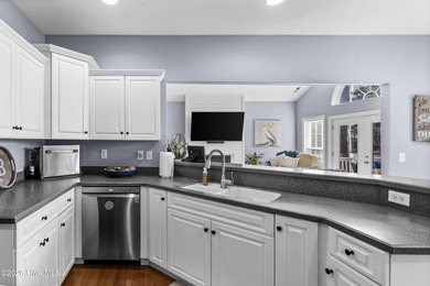 Beautifully situated in the desirable Olde Point community, this on Olde Point Golf and Country Club in North Carolina - for sale on GolfHomes.com, golf home, golf lot