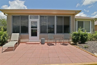 Lovely Kingston Patio home on corner lot with views to the Golf on Eagle Ridge At Spruce Creek Country Club in Florida - for sale on GolfHomes.com, golf home, golf lot