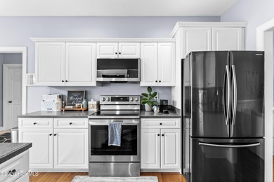 Beautifully situated in the desirable Olde Point community, this on Olde Point Golf and Country Club in North Carolina - for sale on GolfHomes.com, golf home, golf lot