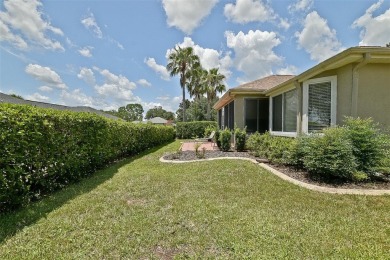 Lovely Kingston Patio home on corner lot with views to the Golf on Eagle Ridge At Spruce Creek Country Club in Florida - for sale on GolfHomes.com, golf home, golf lot