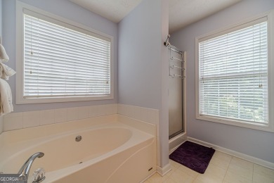 Welcome to 711 Wellington Drive, a charming home nestled in the on Monroe Golf and Country Club in Georgia - for sale on GolfHomes.com, golf home, golf lot
