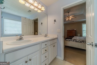 Welcome to 711 Wellington Drive, a charming home nestled in the on Monroe Golf and Country Club in Georgia - for sale on GolfHomes.com, golf home, golf lot