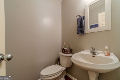 Welcome to 711 Wellington Drive, a charming home nestled in the on Monroe Golf and Country Club in Georgia - for sale on GolfHomes.com, golf home, golf lot