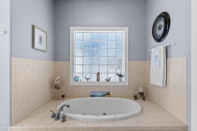 Beautifully situated in the desirable Olde Point community, this on Olde Point Golf and Country Club in North Carolina - for sale on GolfHomes.com, golf home, golf lot